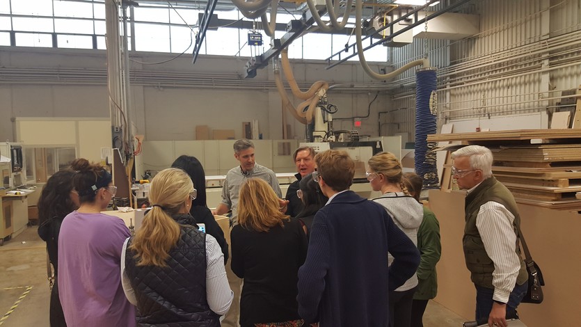 Mark gives a shop tour to Endicott College students