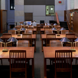 MRW built these work tables for the Widener Library at Harvard. The warm wood paneling and the custom wood furniture are a perfect combination with the cooler grey walls