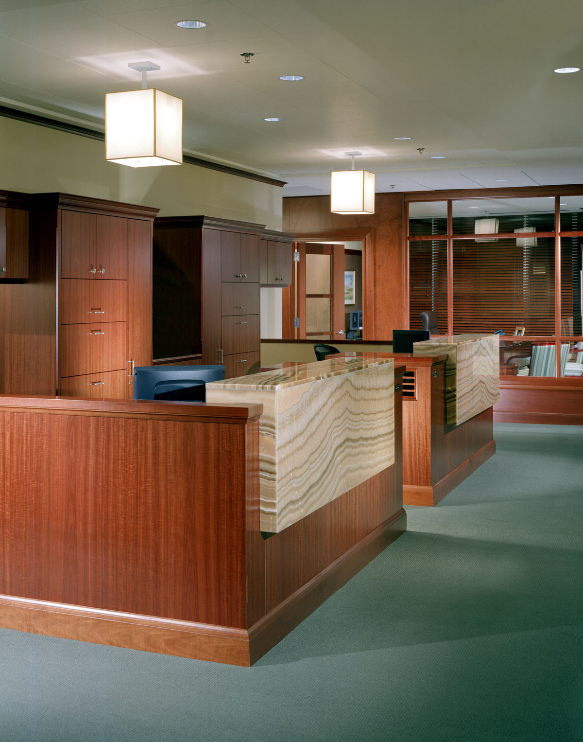 These custom wood built-ins will stand the test of time. We eventually did a further renovation of Bain's office.