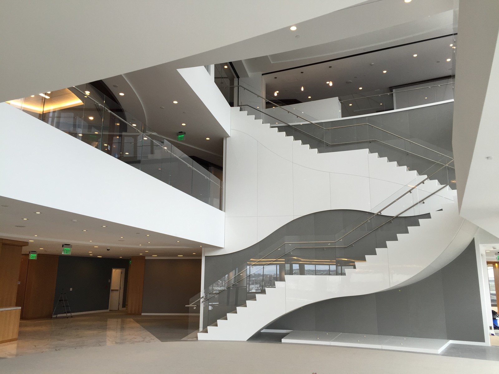 This gorgeous space is capped off with signature curved staircases showcasing our expertise in polished laquer work.  