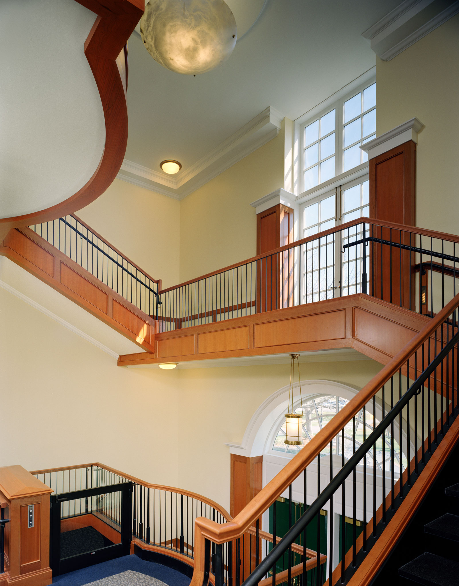 This grand stair, trim, rail and wall paneling was impeccably renovated by MRW. 