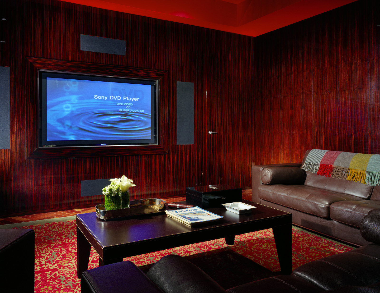 These custom wall panels make for an timeless, elegant and cozy media room
