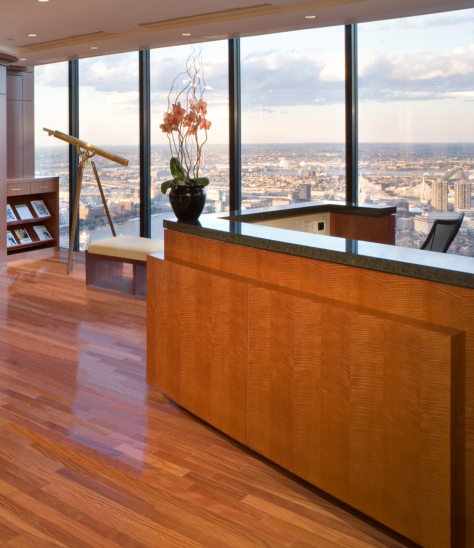 This reception desk sets the warm tone for this dramatic space in the center of Boston.