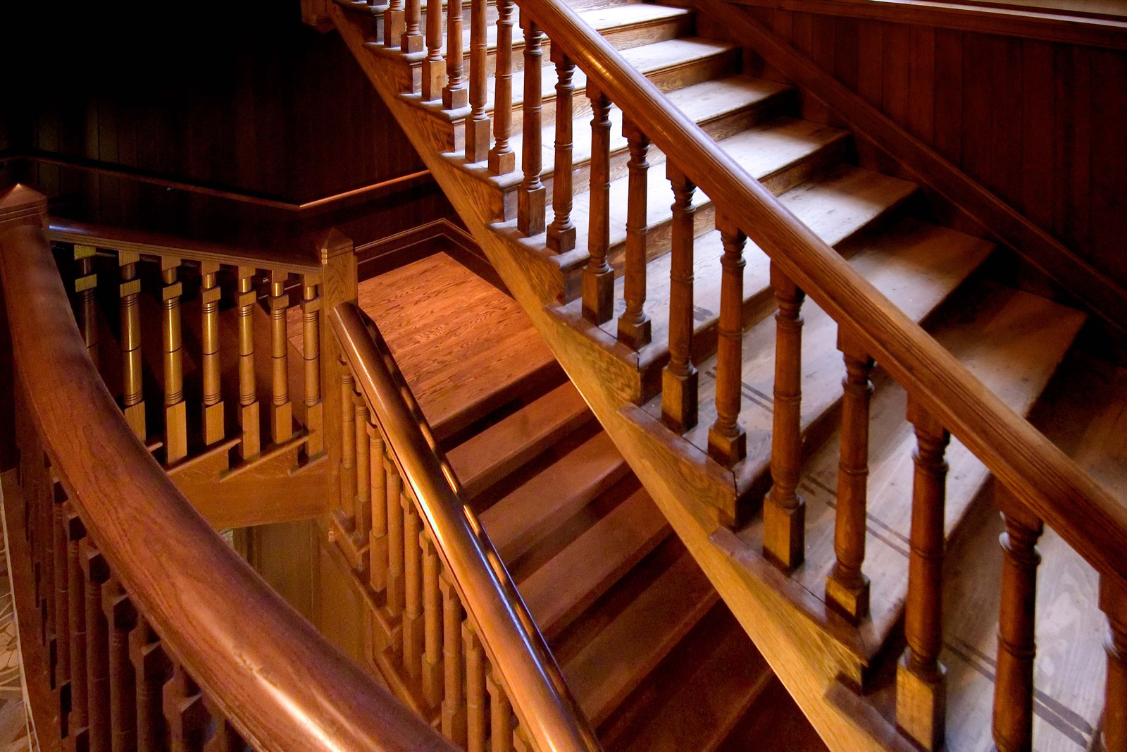 Restored handrail and stairs for this historic staircase.