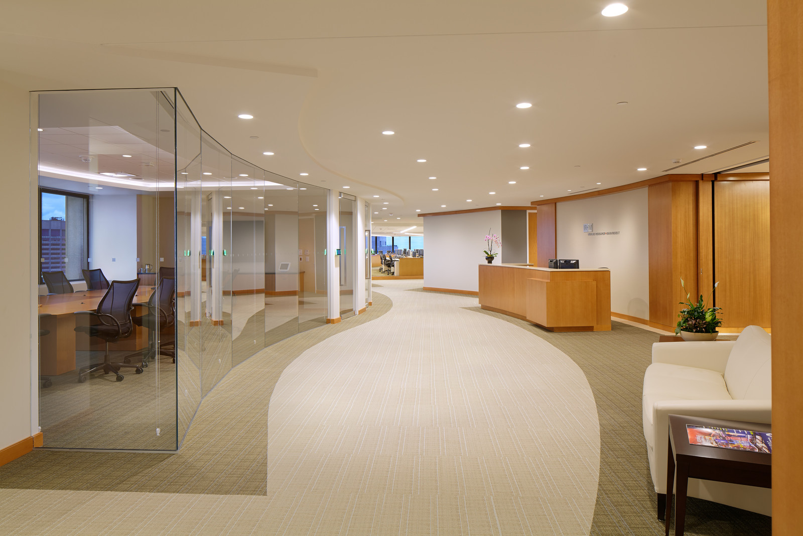 Glass and wood adorn this modern Boston space. This timeless space was designed to always look current. 