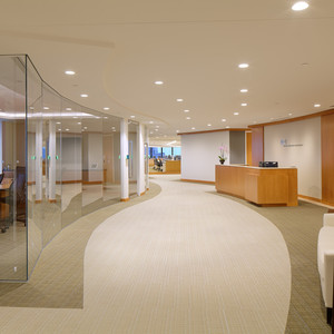 Glass and wood adorn this modern Boston space. This timeless space was designed to always look current. 