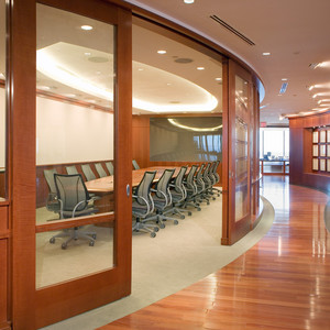 This beautiful curved conference room has MRW touches on it. From the curved, sliding doors,the conference table, the wainscotting and the servery these pieces combined make the room.  