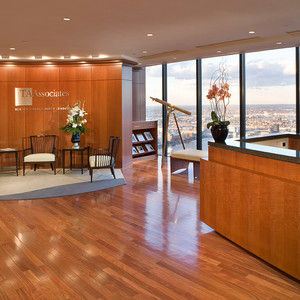 Custom wood panels and reception desk highlight this gorgeous reception area