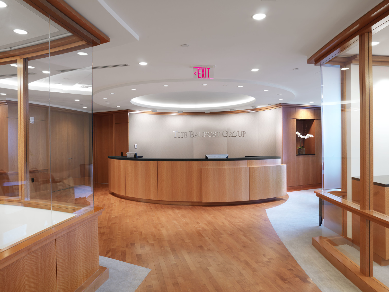 Custom trim, wall panels and recption desk enhance this elegant space