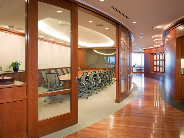 This beautiful curved conference room has MRW touches on it. From the curved, sliding doors,the conference table, the wainscotting and the servery these pieces combined make the room.  