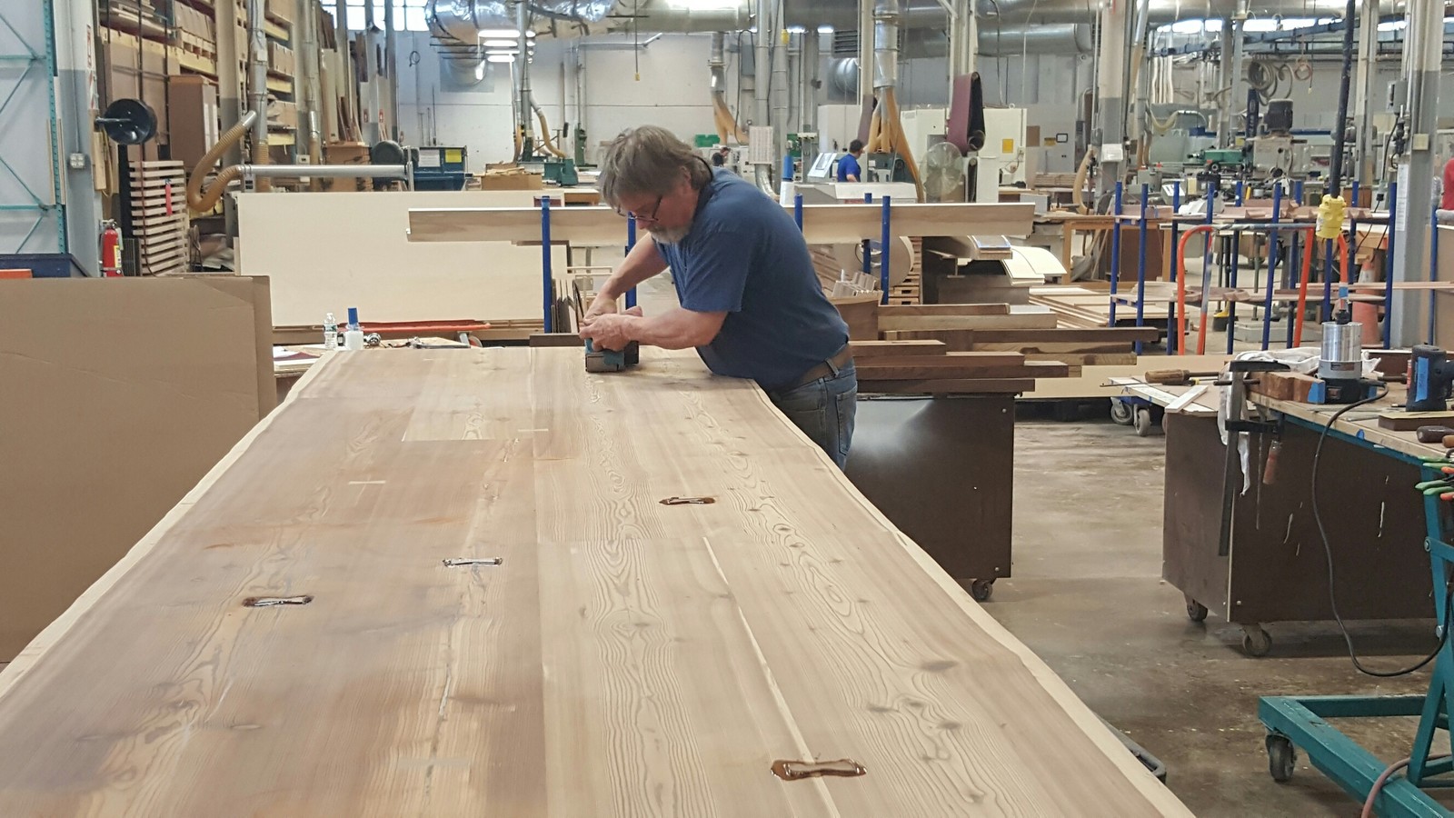 A conference table in the making in the shop
