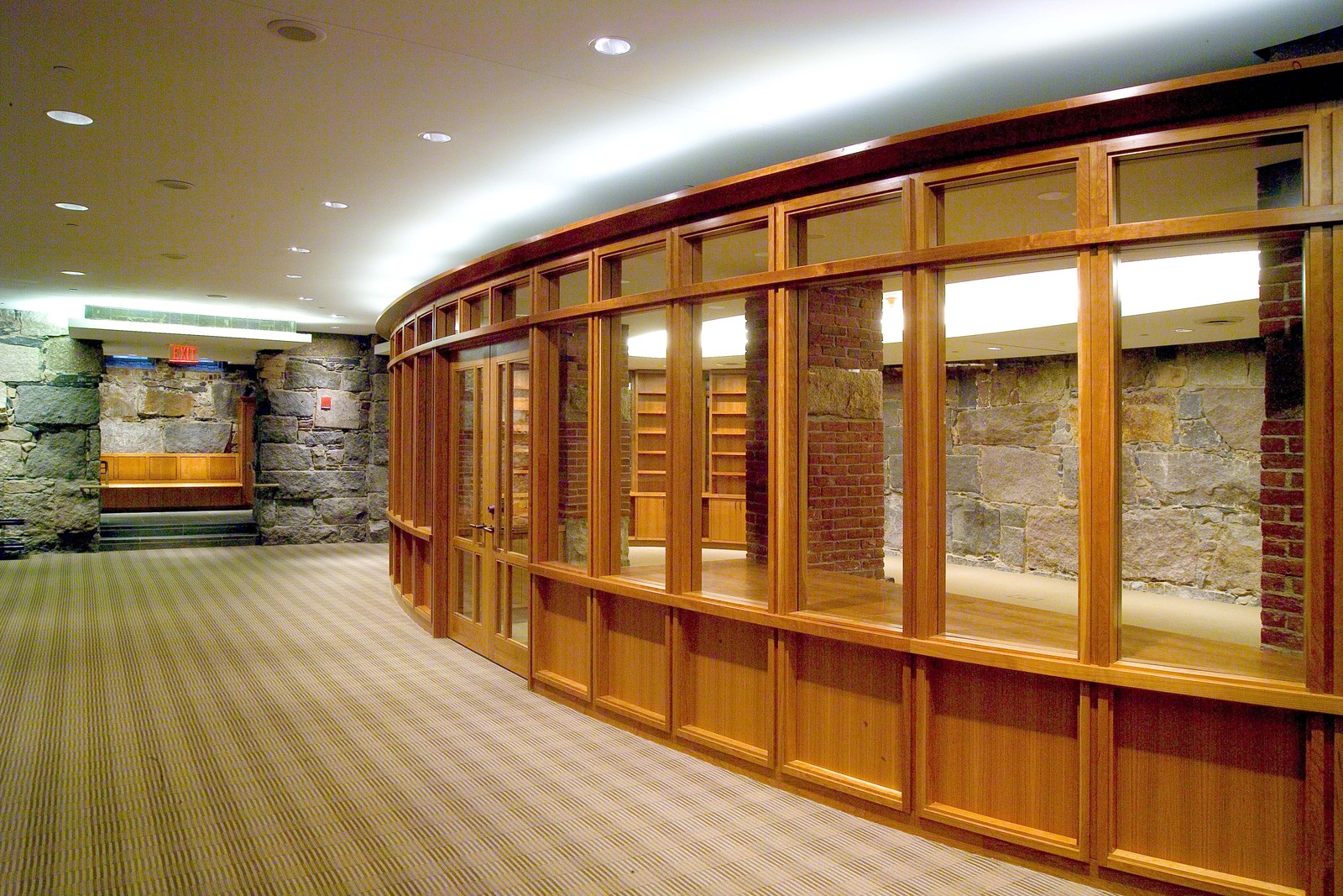 Curved wood with a granite backdrop make for a unique meeting space at the church. This is one of the most iconic churches in Boston. 