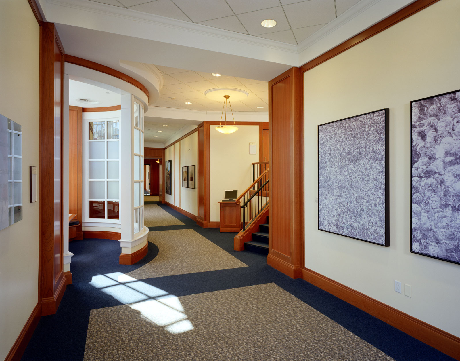 A beautiful curved wall enhances this space. The quality and craftsmanship we put in our trim and wall panels will stand the test of time at Harvard.