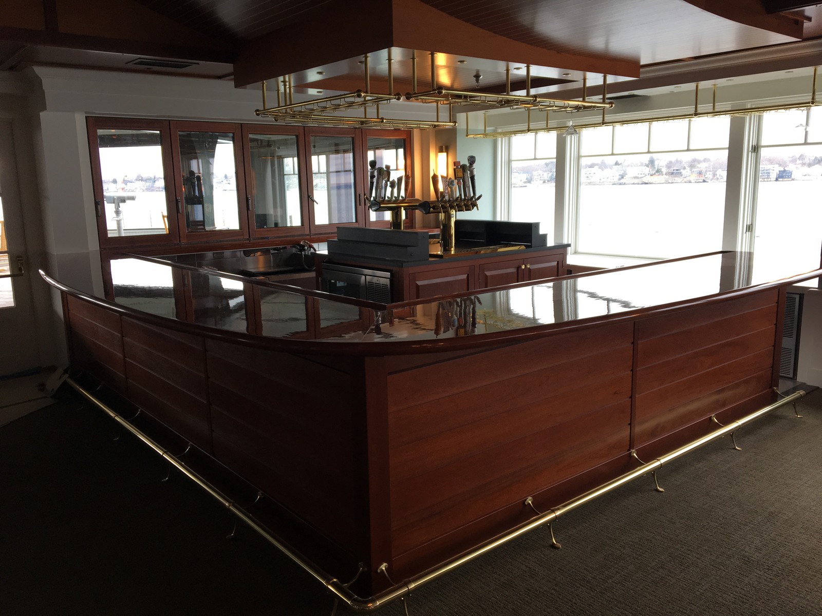 Another view of this custom mahogany bar and ceiling